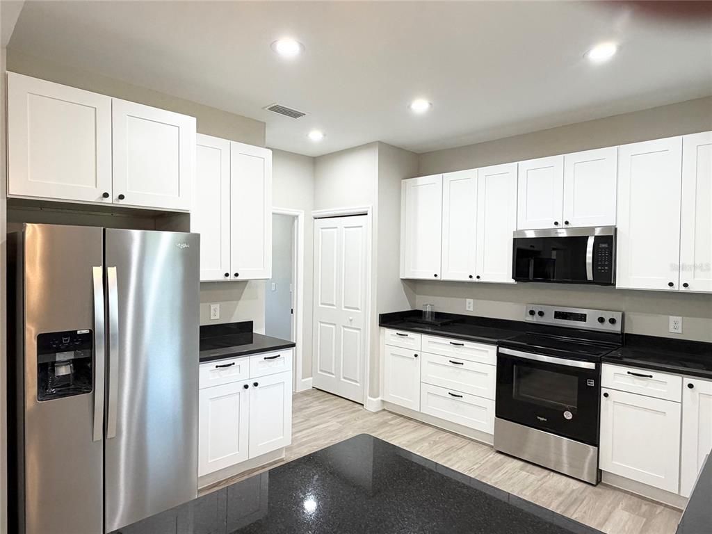 Interior, Kitchen, Recessed Lighting, Stainless Steel Appliances, Wood Texture Flooring