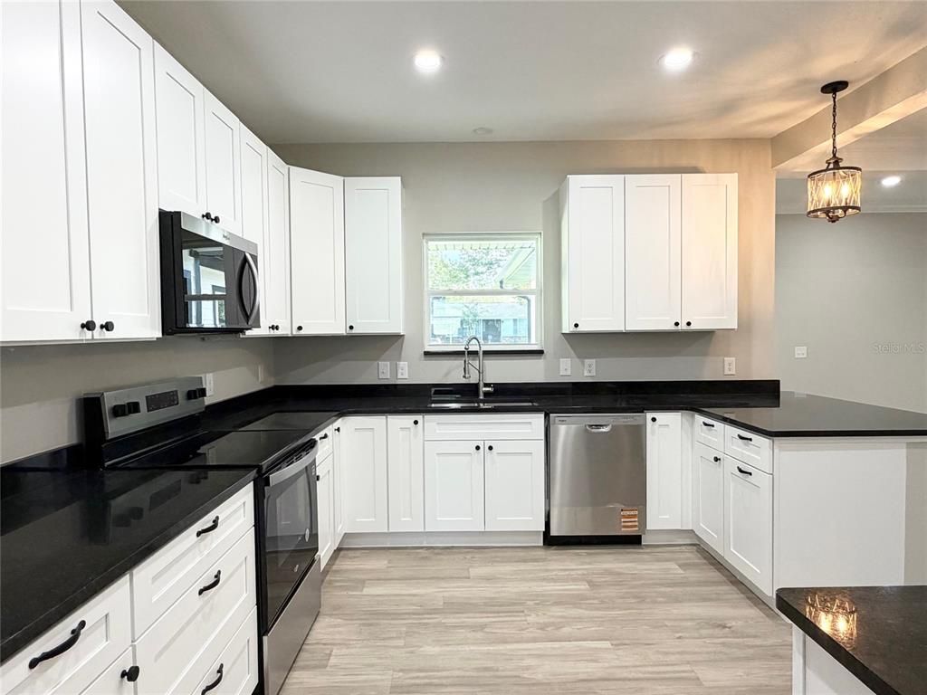 Interior, Kitchen, Pendant Lights, Recessed Lighting, Stainless Steel Appliances, Wood Texture Flooring