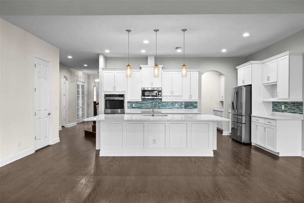 Interior, Kitchen, Pendant Lights, Recessed Lighting, Stainless Steel Appliances, Wood Texture Flooring
