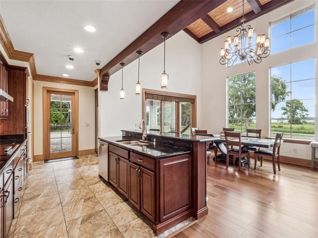 Chandelier, Dining room, Interior, Kitchen, Pendant Lights, Recessed Lighting, Wooden Beams, Wooden Ceilings, Wood Texture Flooring