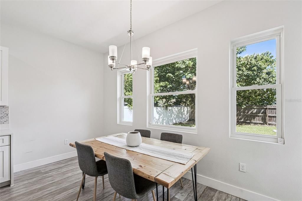 Chandelier, Dining room, Interior, Pendant Lights, Wood Texture Flooring