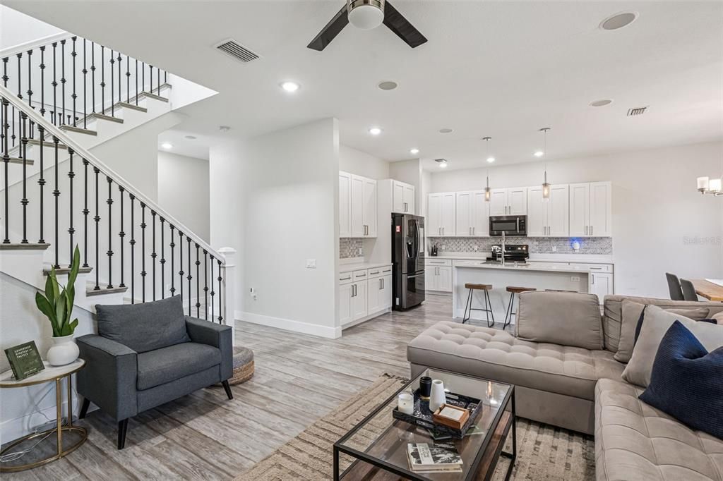 Dining room, Interior, Kitchen, Living room, Pendant Lights, Recessed Lighting, Stainless Steel Appliances, Wood Texture Flooring