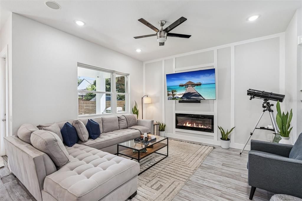 Fireplace, Interior, Living room, Recessed Lighting, Wood Texture Flooring