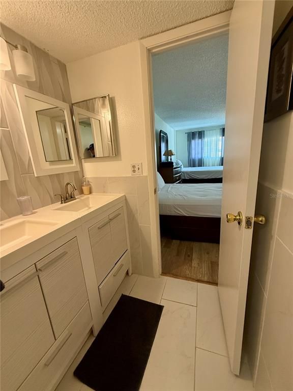 Bathroom, Bedroom, Dual Sink Vanities, Interior, Marble, Wood Texture Flooring