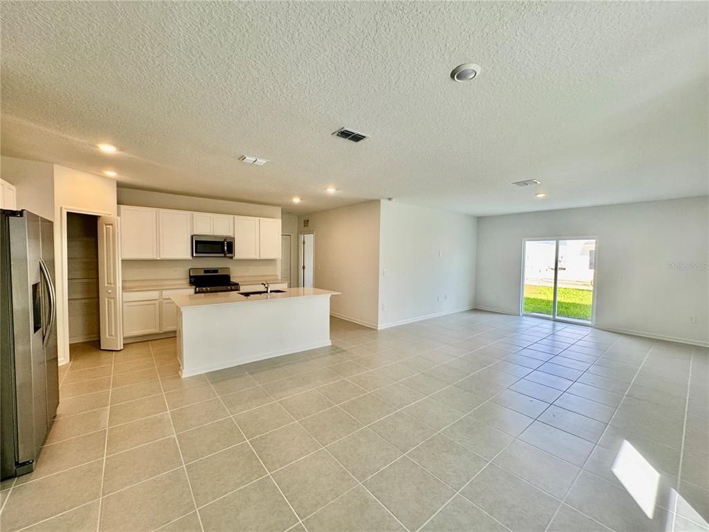 Empty room, Interior, Kitchen, Recessed Lighting, Stainless Steel Appliances