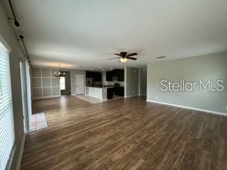 Chandelier, Empty room, Interior, Kitchen, Recessed Lighting, Wood Texture Flooring