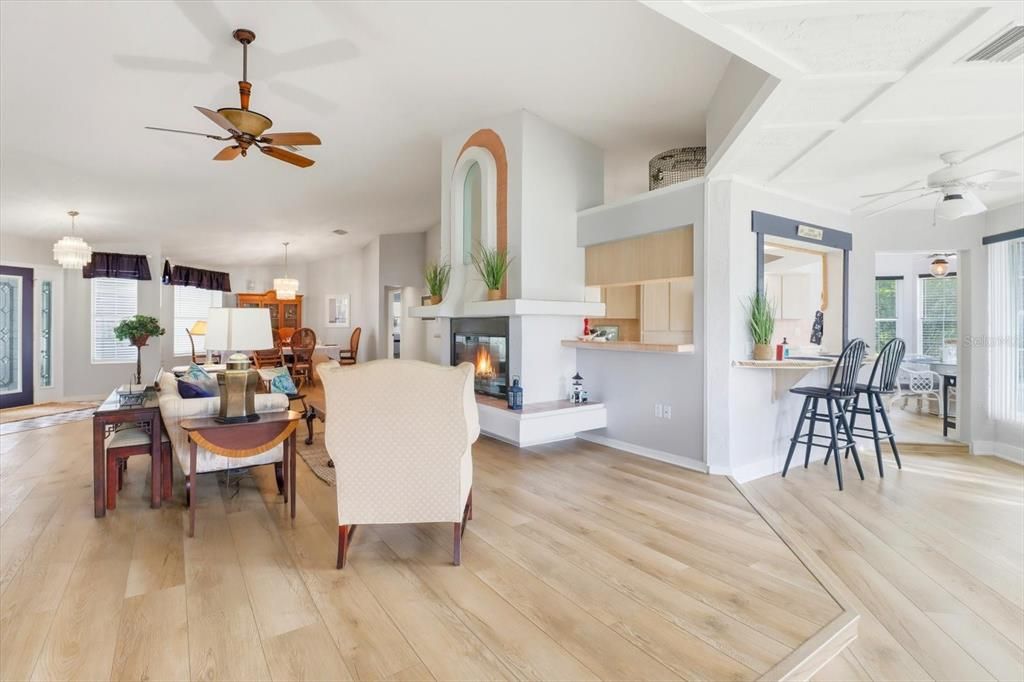 Chandelier, Dining room, Fireplace, Interior, Kitchen, Pendant Lights, Wood Texture Flooring