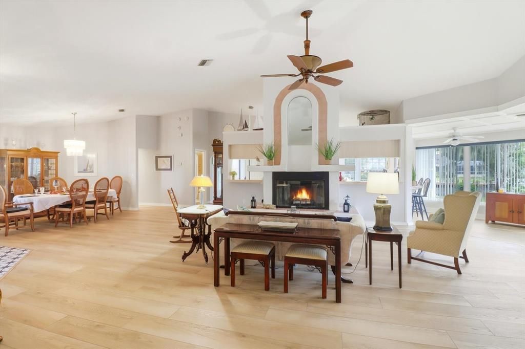 Chandelier, Dining room, Fireplace, Interior, Living room, Pendant Lights, Wood Texture Flooring