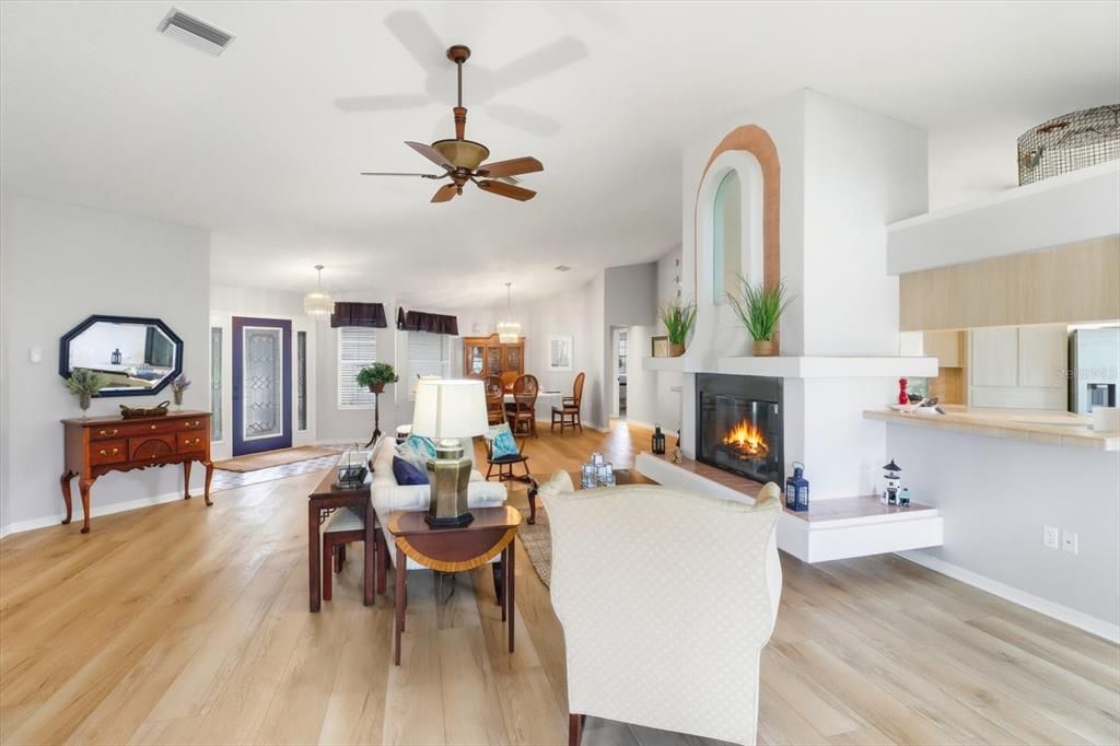 Chandelier, Dining room, Fireplace, Interior, Kitchen, Living room, Pendant Lights, Wood Texture Flooring