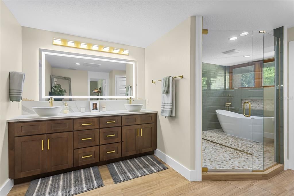 Bathroom, Dual Sink Vanities, Free Standing Baths, Glass Shower, Interior, Recessed Lighting, Wood Texture Flooring