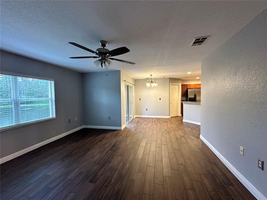 Chandelier, Empty room, Interior, Kitchen, Recessed Lighting, Wood Texture Flooring