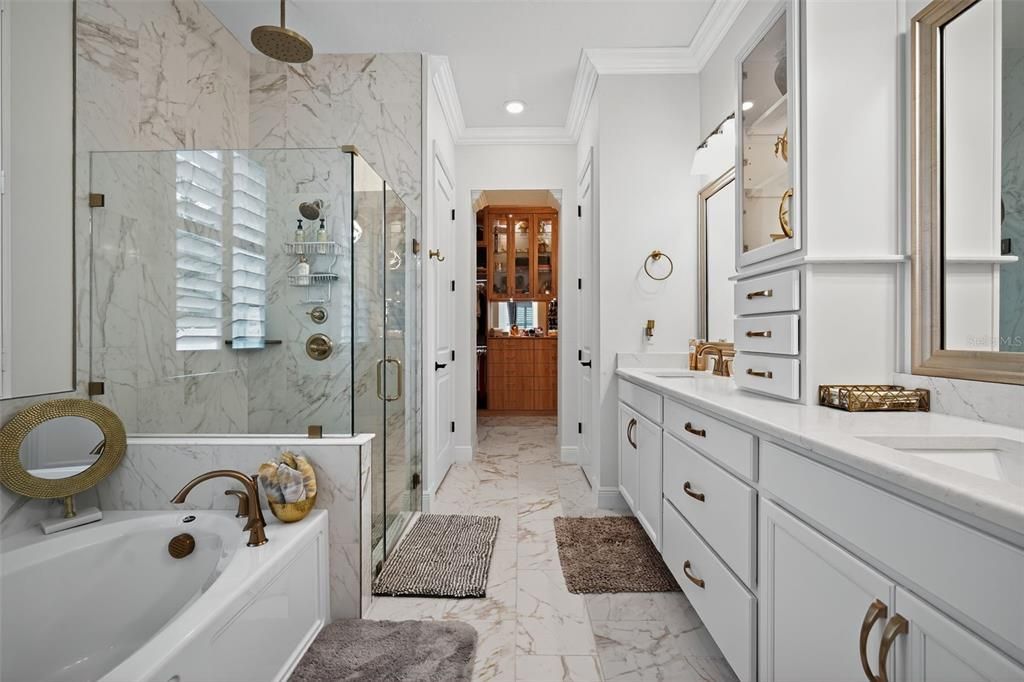 Bathroom, Dual Sink Vanities, Glass Shower, Interior, Marble, Marble Walls, Recessed Lighting