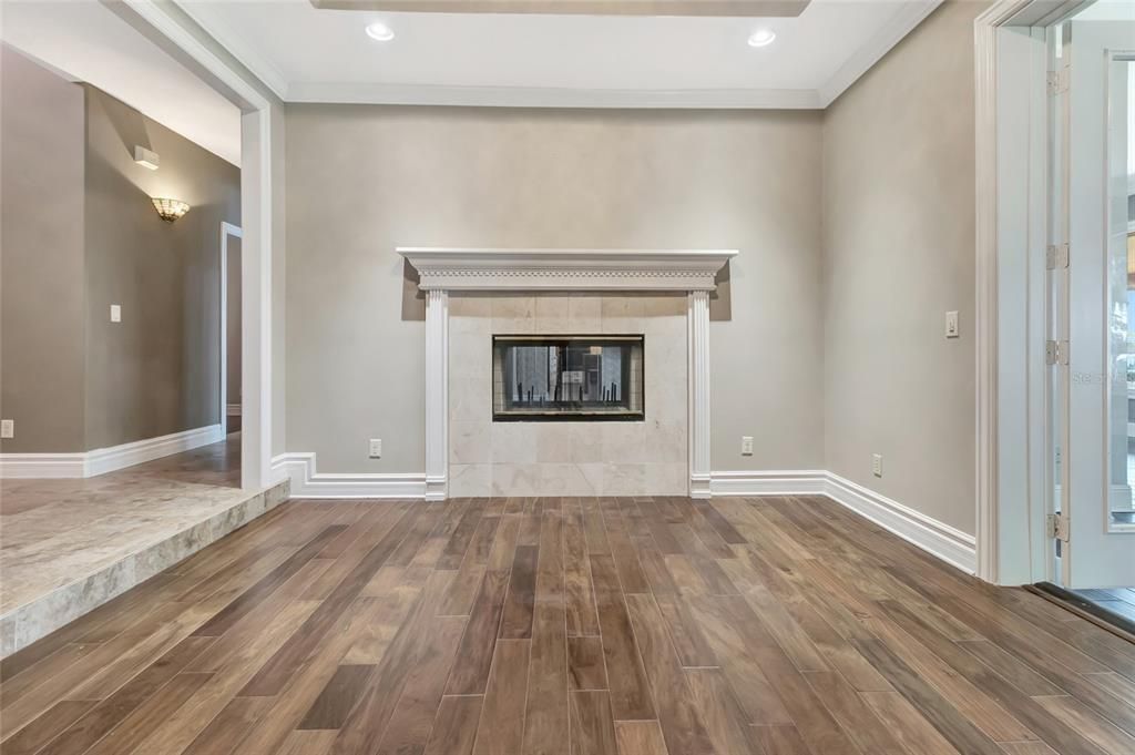 Empty room, Fireplace, Interior, Recessed Lighting, Wood Texture Flooring