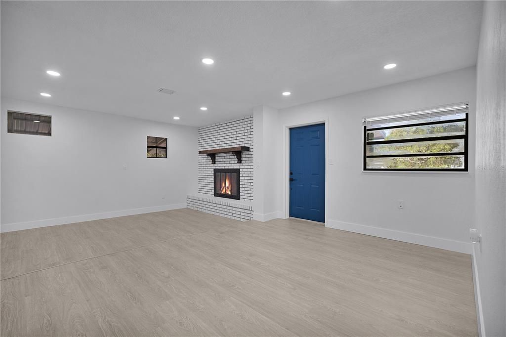 Empty room, Fireplace, Interior, Recessed Lighting, Wood Texture Flooring
