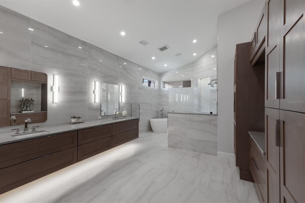 Bathroom, Dual Sink Vanities, Free Standing Baths, Glass Shower, Interior, Marble, Marble Walls, Recessed Lighting