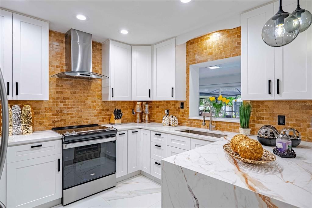 Interior, Kitchen, Marble, Recessed Lighting, Stainless Steel Appliances, Stone Walls