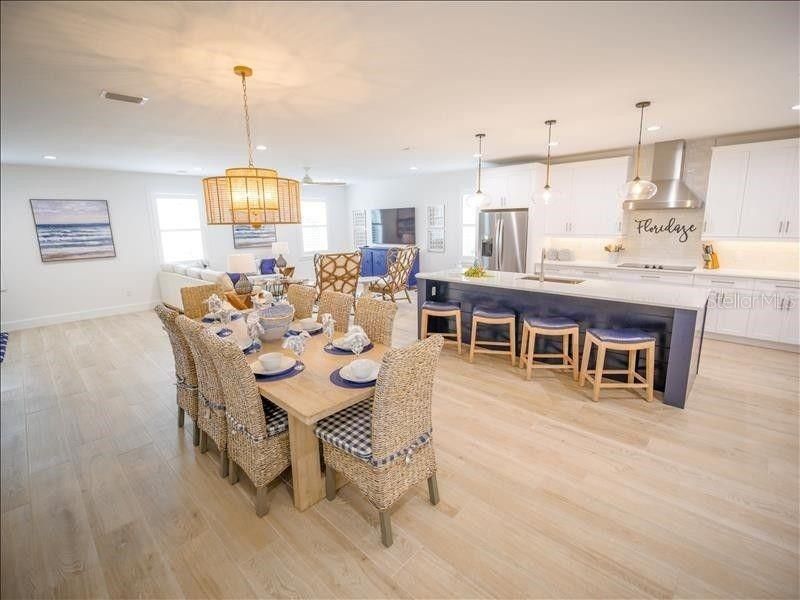 Dining room, Interior, Kitchen, Pendant Lights, Recessed Lighting, Stainless Steel Appliances, Wood Texture Flooring