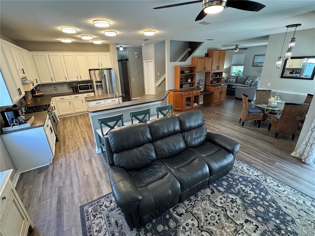 Dining room, Interior, Kitchen, Living room, Pendant Lights, Stainless Steel Appliances, Wood Texture Flooring