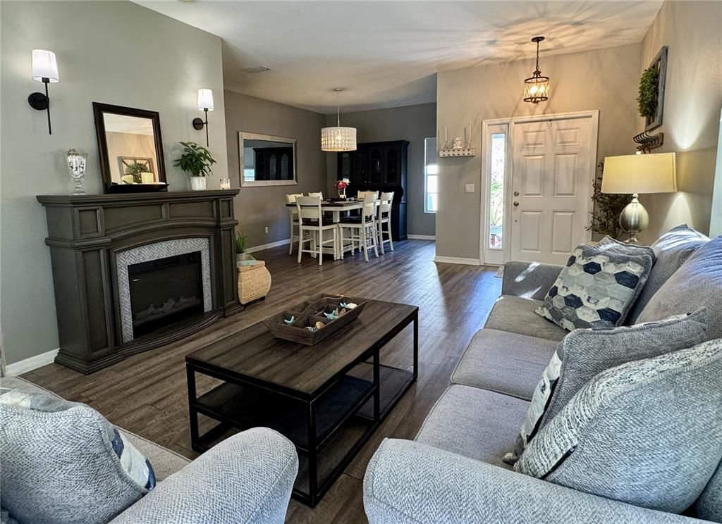 Chandelier, Dining room, Fireplace, Interior, Living room, Pendant Lights, Wood Texture Flooring