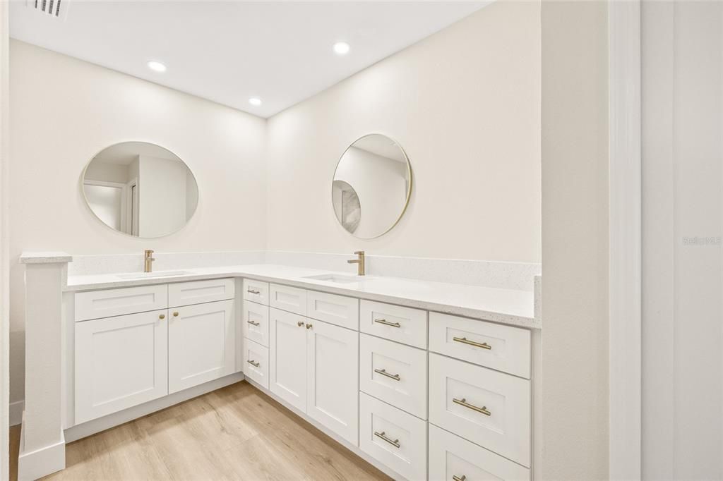 Bathroom, Dual Sink Vanities, Interior, Recessed Lighting, Wood Texture Flooring