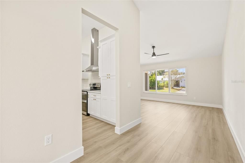 Empty room, Interior, Kitchen, Stainless Steel Appliances, Wood Texture Flooring