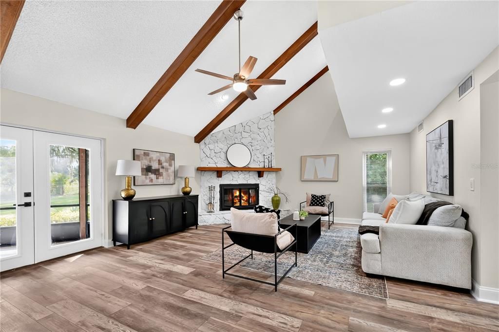 Fireplace, Interior, Living room, Recessed Lighting, Stone Walls, Wooden Beams, Wood Texture Flooring