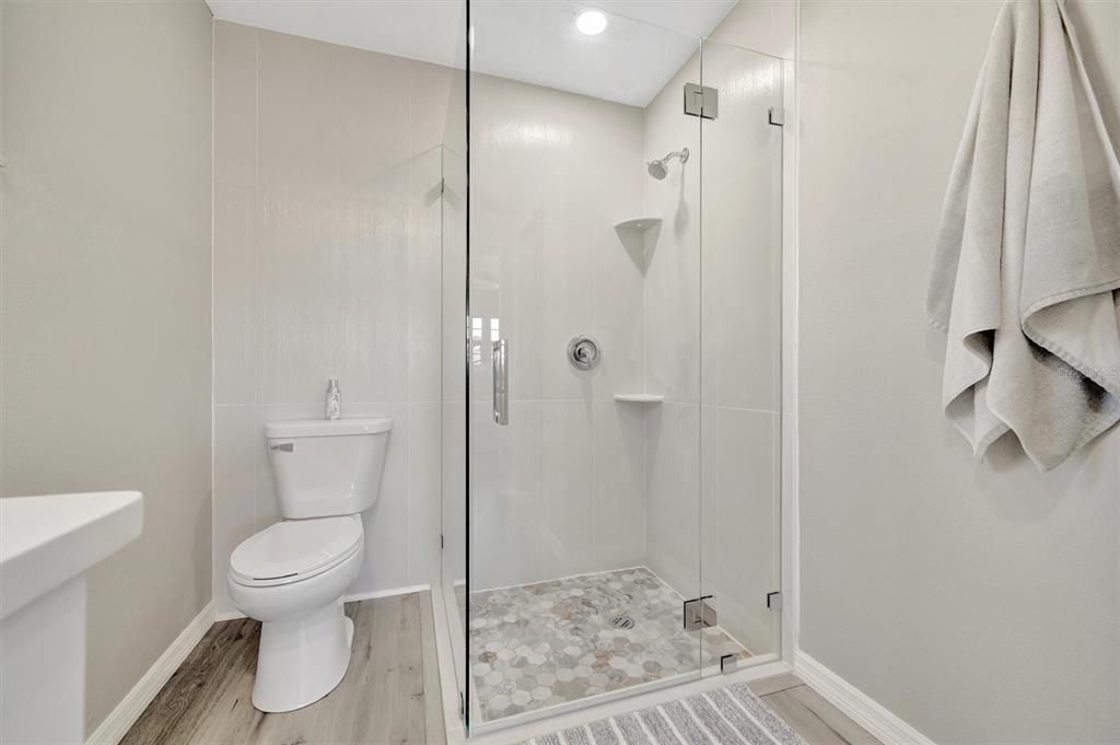 Bathroom, Glass Shower, Interior, Recessed Lighting, Wood Texture Flooring