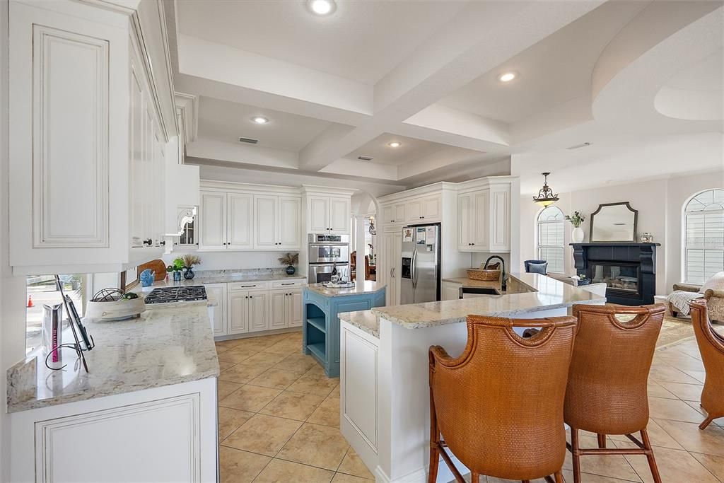 Fireplace, Interior, Kitchen, Pendant Lights, Recessed Lighting, Stainless Steel Appliances