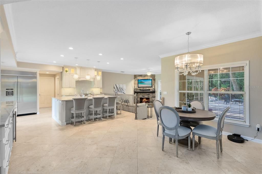 Chandelier, Dining room, Fireplace, Interior, Kitchen, Pendant Lights, Recessed Lighting, Stainless Steel Appliances