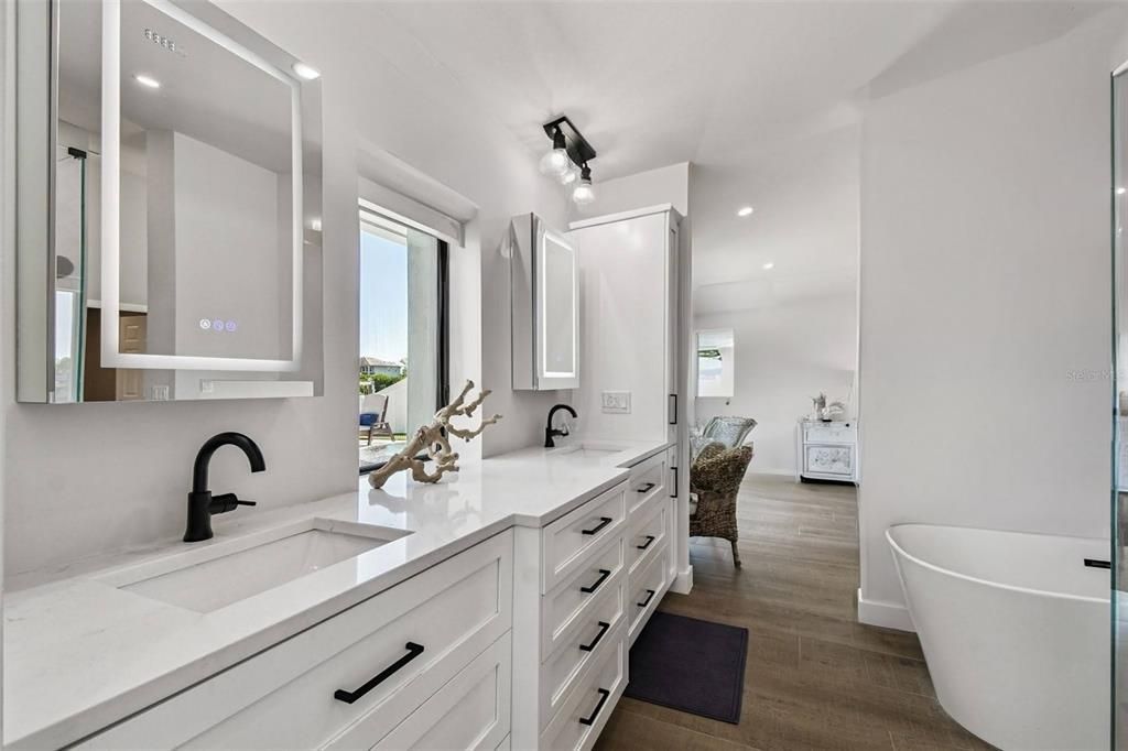 Bathroom, Dual Sink Vanities, Free Standing Baths, Interior, Recessed Lighting, Wood Texture Flooring