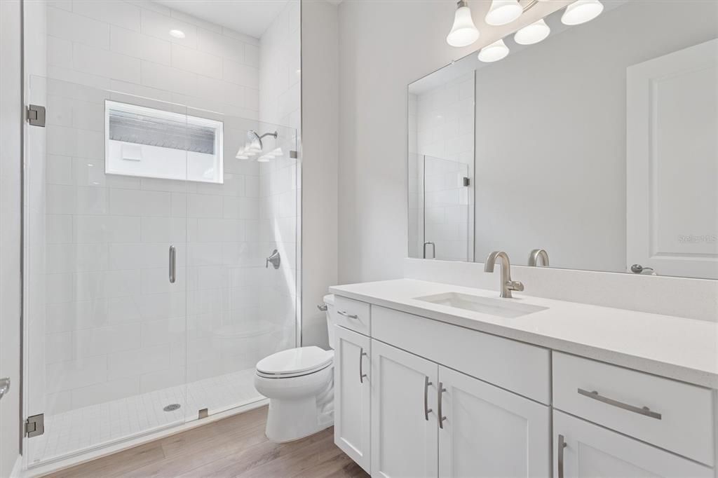 Bathroom, Glass Shower, Interior, Recessed Lighting, Wood Texture Flooring