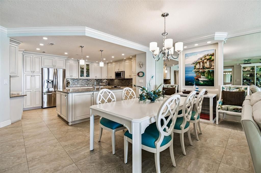 Chandelier, Dining room, Interior, Kitchen, Pendant Lights, Recessed Lighting, Stainless Steel Appliances