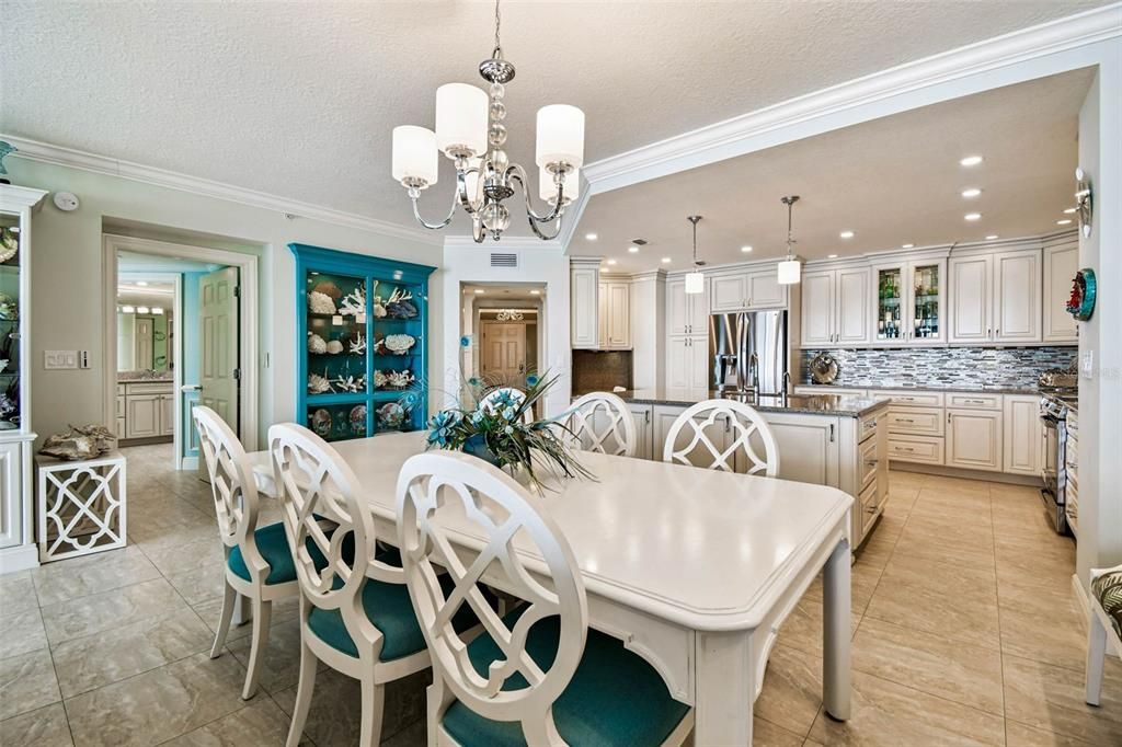 Chandelier, Dining room, Interior, Kitchen, Pendant Lights, Recessed Lighting, Stainless Steel Appliances