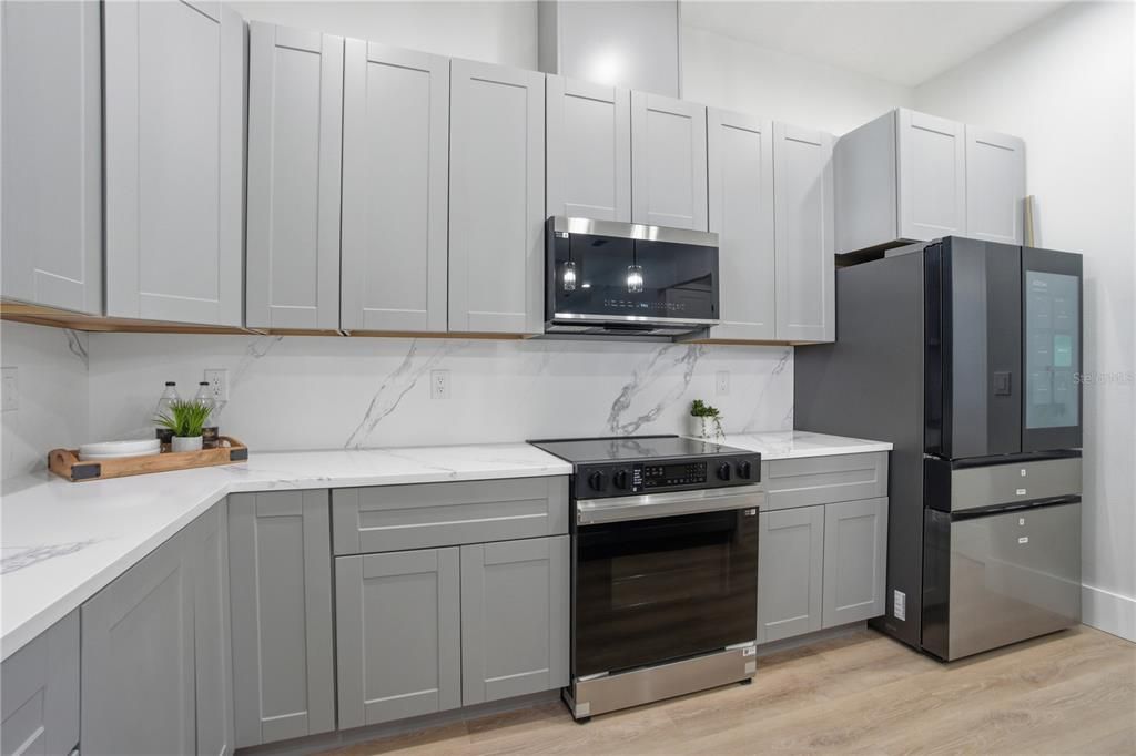 Interior, Kitchen, Marble Walls, Stainless Steel Appliances, Wood Texture Flooring