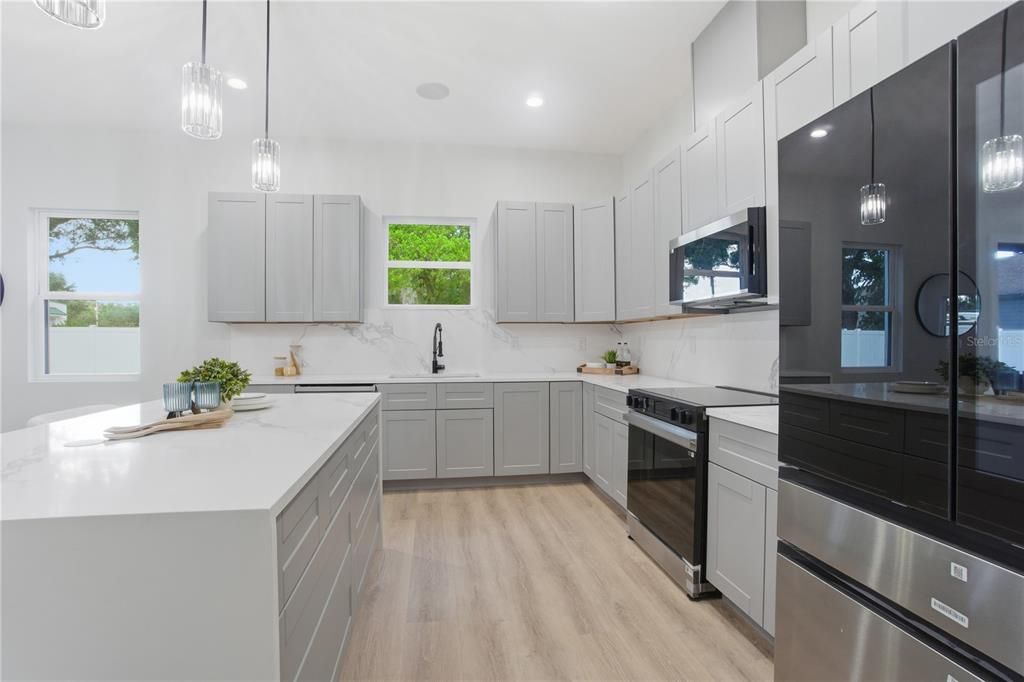 Interior, Kitchen, Pendant Lights, Recessed Lighting, Stainless Steel Appliances, Wood Texture Flooring