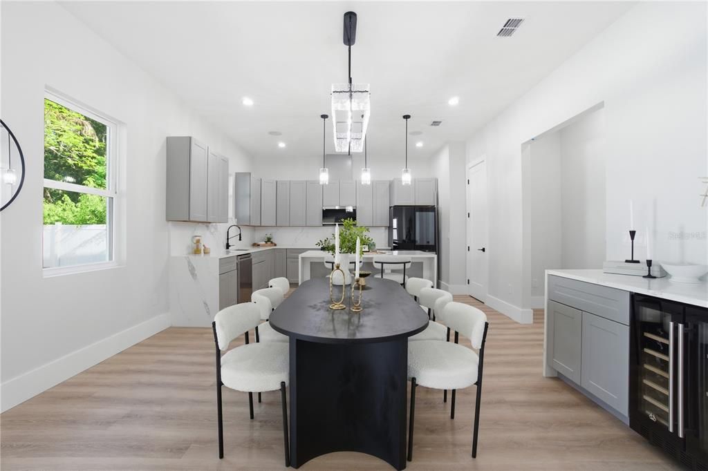 Dining room, Interior, Kitchen, Pendant Lights, Recessed Lighting, Stainless Steel Appliances, Wood Texture Flooring