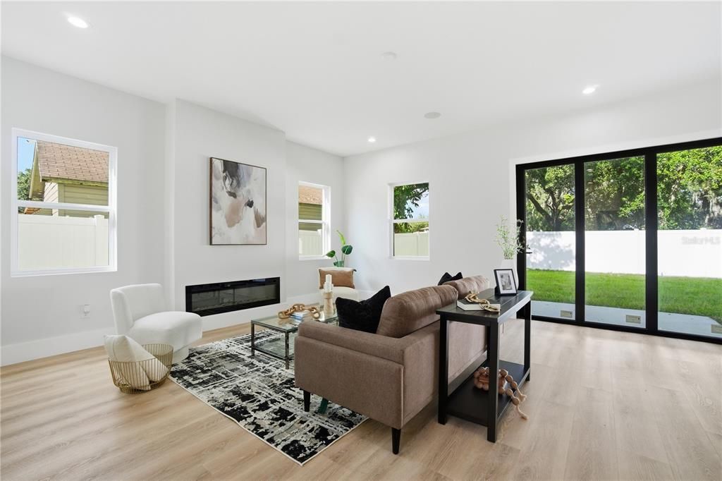 Fireplace, Interior, Living room, Recessed Lighting, Wood Texture Flooring