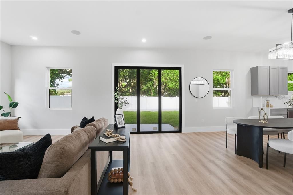 Dining room, Interior, Living room, Pendant Lights, Recessed Lighting, Wood Texture Flooring