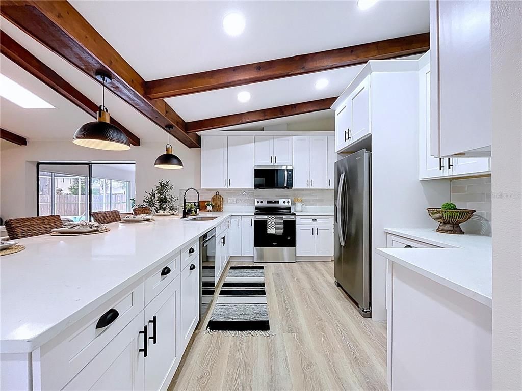 Interior, Kitchen, Pendant Lights, Recessed Lighting, Stainless Steel Appliances, Wooden Beams, Wood Texture Flooring