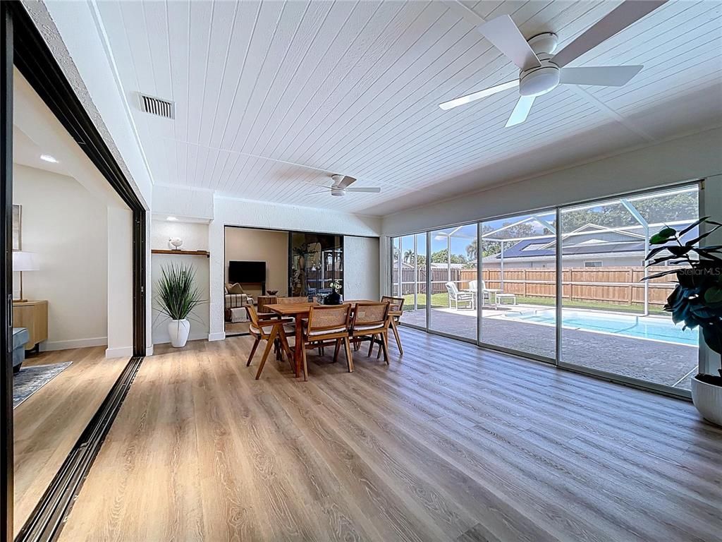Dining room, Interior, Recessed Lighting, Sun Room, Wood Texture Flooring