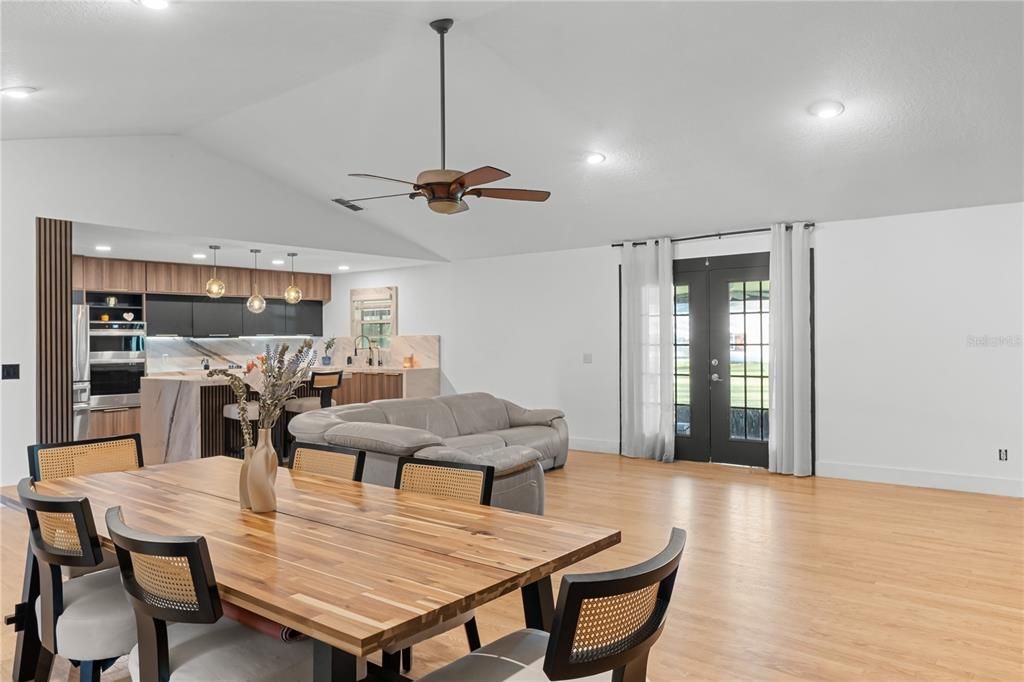 Dining room, Interior, Kitchen, Pendant Lights, Recessed Lighting, Stainless Steel Appliances, Wood Texture Flooring