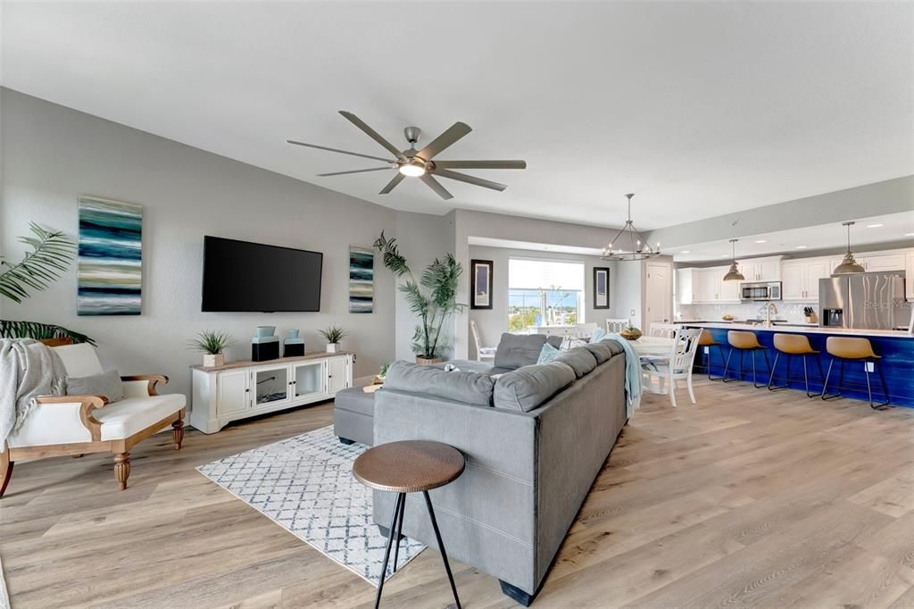 Dining room, Interior, Kitchen, Living room, Pendant Lights, Recessed Lighting, Stainless Steel Appliances, Wood Texture Flooring