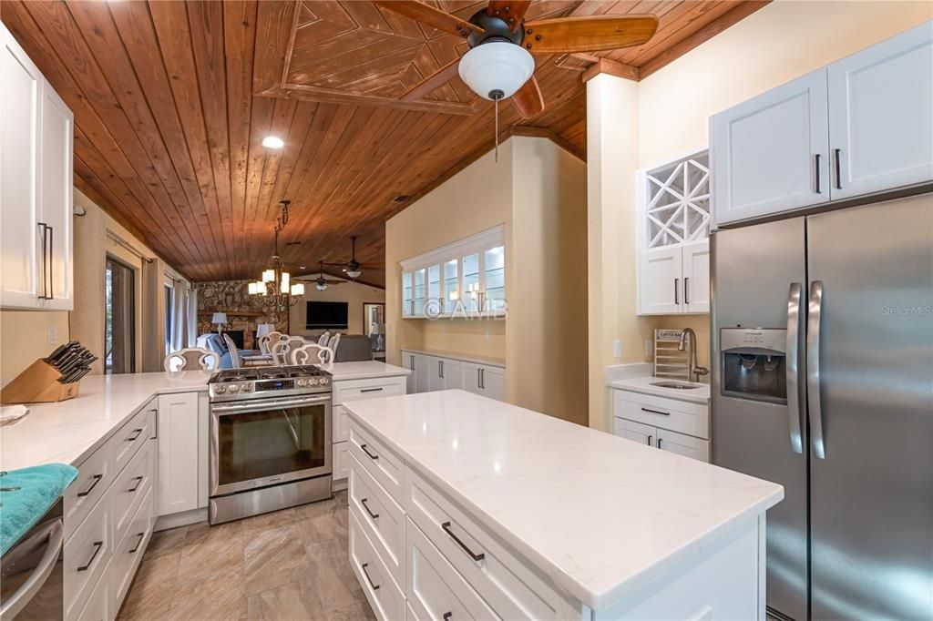 Chandelier, Interior, Kitchen, Pendant Lights, Recessed Lighting, Stainless Steel Appliances, Wooden Ceilings