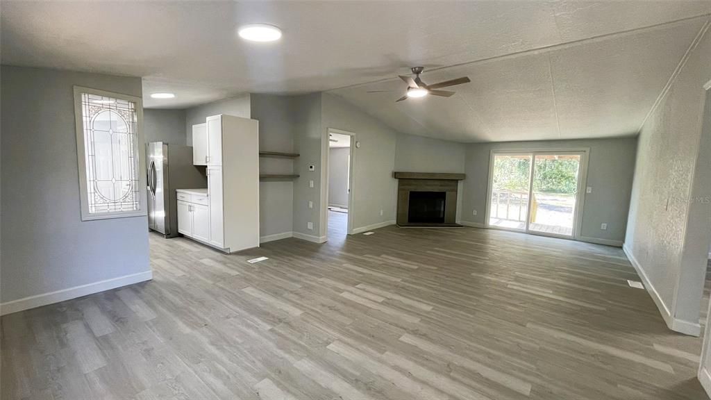 Empty room, Fireplace, Interior, Recessed Lighting, Wood Texture Flooring