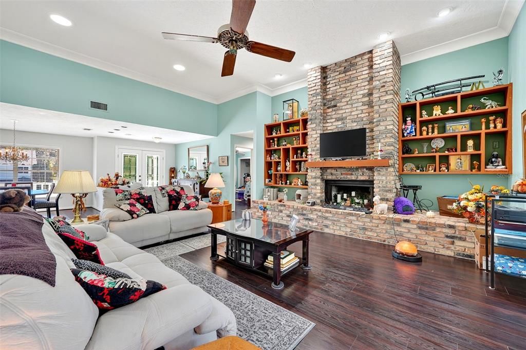 Fireplace, Interior, Living room, Recessed Lighting, Stone Walls, Wood Texture Flooring