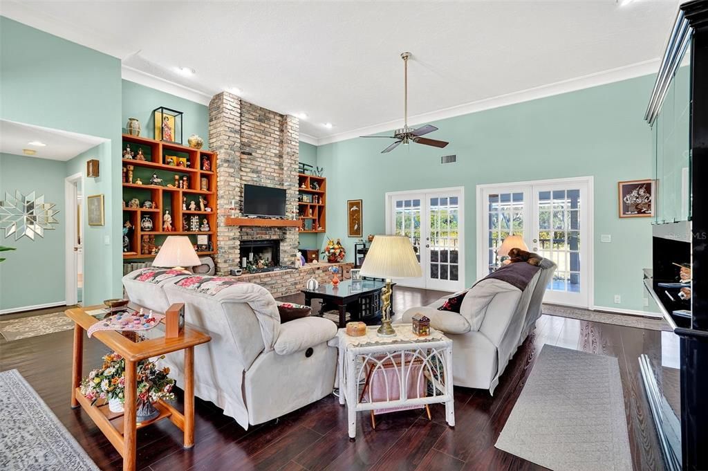 Fireplace, Interior, Living room, Recessed Lighting, Stone Walls, Wood Texture Flooring