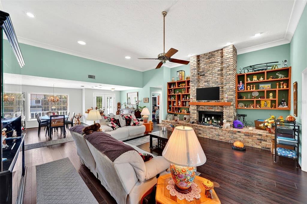 Dining room, Fireplace, Interior, Living room, Pendant Lights, Recessed Lighting, Stone Walls, Wood Texture Flooring