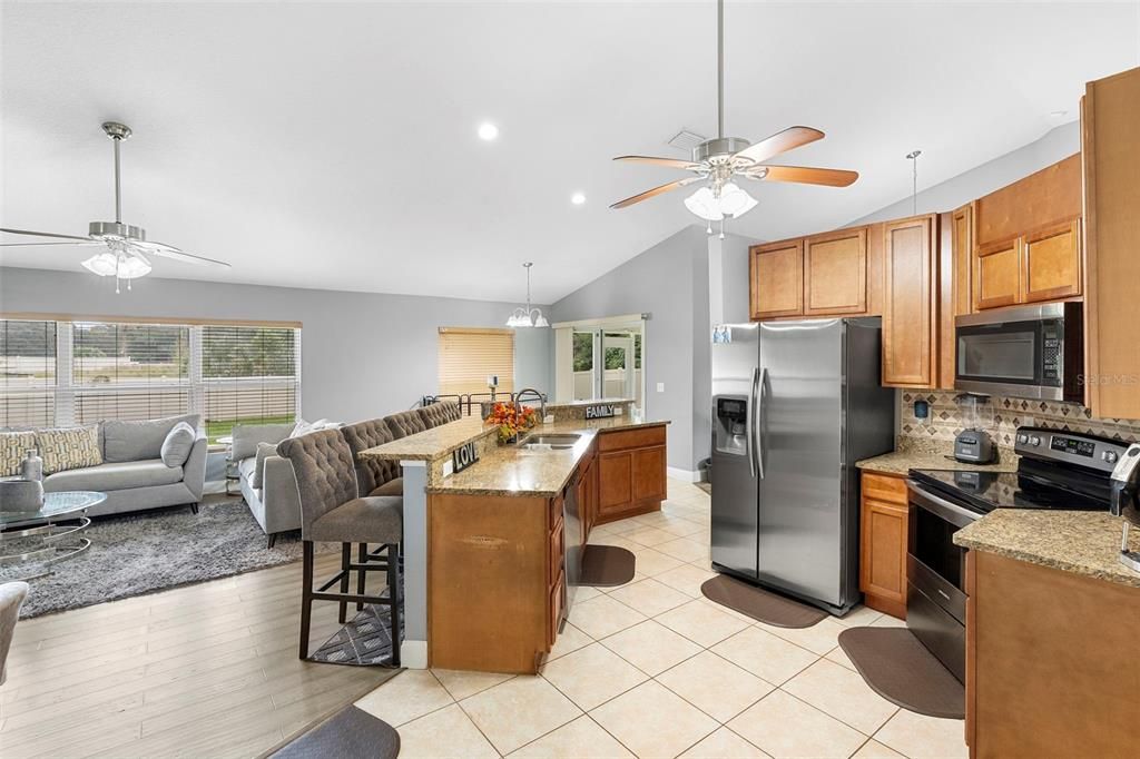 Chandelier, Dining room, Interior, Kitchen, Living room, Pendant Lights, Recessed Lighting, Wood Texture Flooring