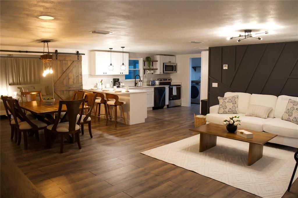 Dining room, Interior, Kitchen, Living room, Pendant Lights, Recessed Lighting, Stainless Steel Appliances, Wood Texture Flooring