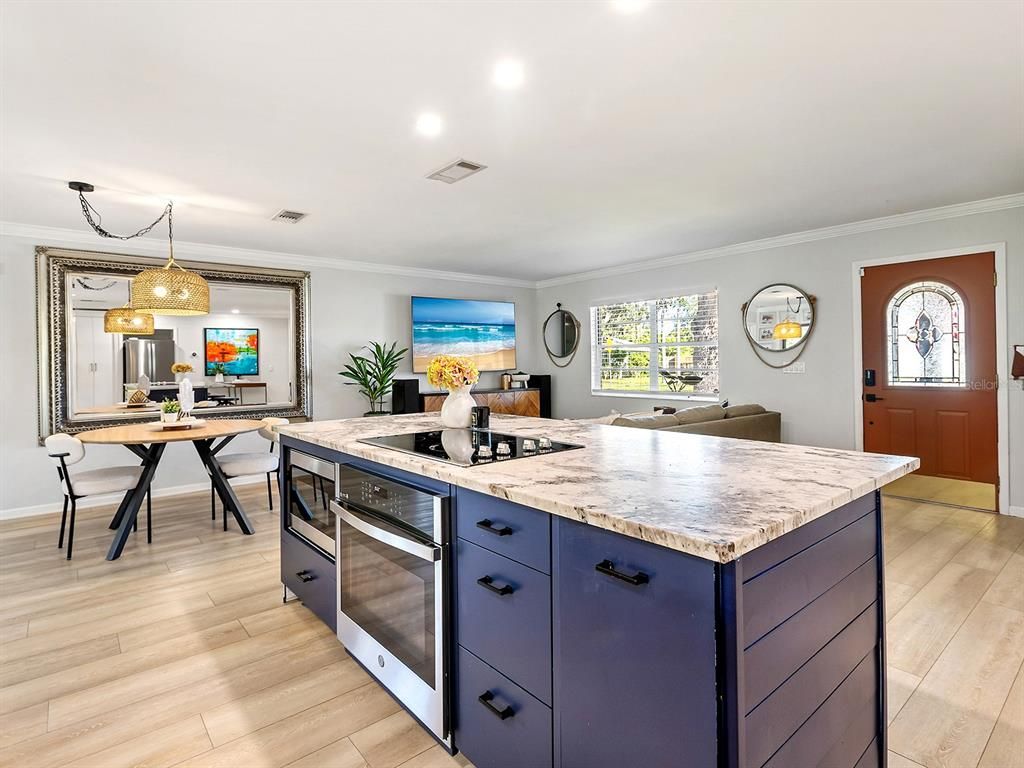 Dining room, Interior, Kitchen, Pendant Lights, Recessed Lighting, Stainless Steel Appliances, Wood Texture Flooring